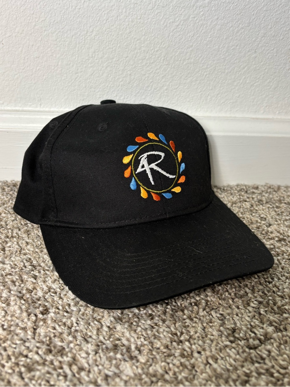 Black Baseball Hat with Fun Embroidered Colorful Logo